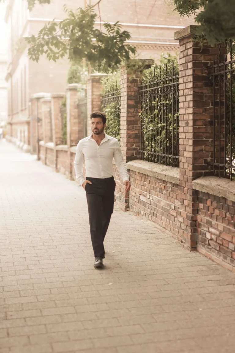 Male model is walking in a white shirt